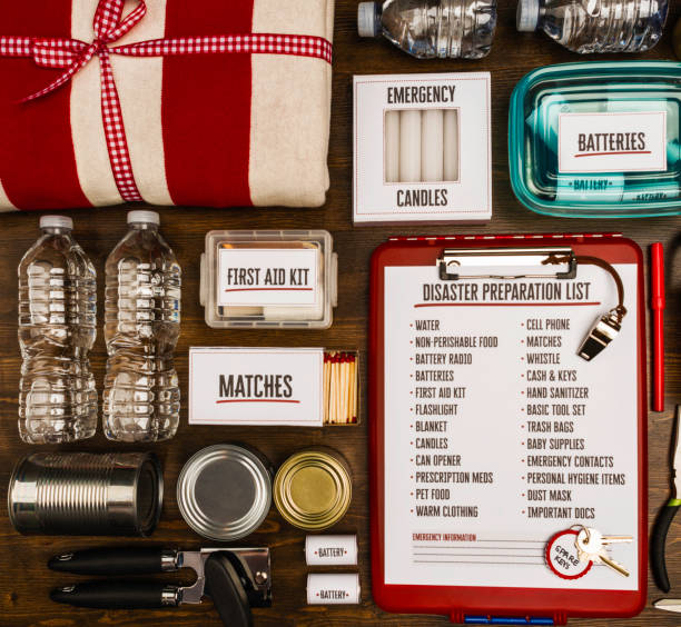 flat lay of a collection of items for disaster preparedness and emergency planning - disaster supply kit stock pictures, royalty-free photos & images